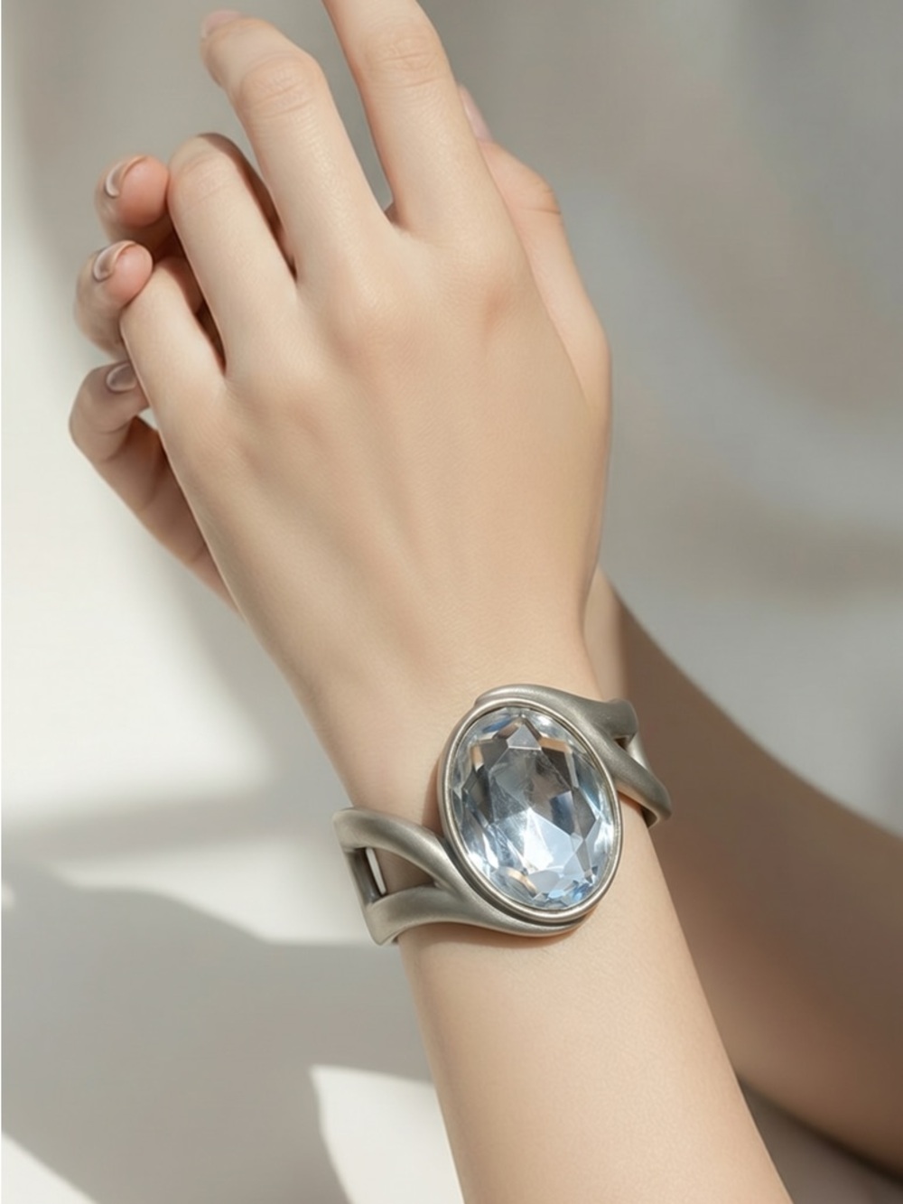 Silver-Tone Bracelet with Light Blue Crystal Center